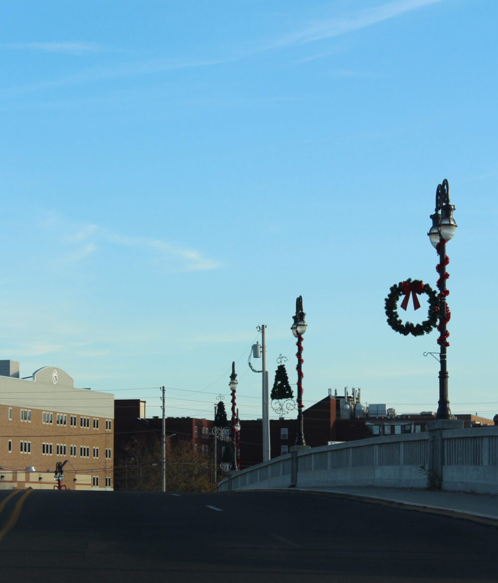 Buildings and light poles with Christmas decorations